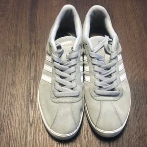 Gray Adidas tennis shoes